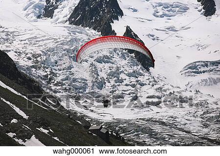 Paraglider Flying View Large Photo Image Stock Image - Paraglider Flying. Fotosearch