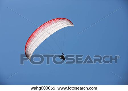 Stock Photography - Paraglider Flying. Fotosearch
