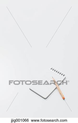 Pencil and note pad View Large Photo Image Stock Photograph - Pencil and note pad . Fotosearch