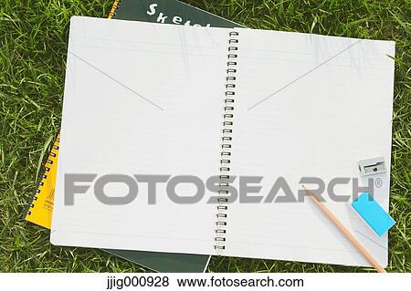Pencil and notebooks on grass View Large Photo Image Stock Photo - Pencil and notebooks on grass. Fotosearch