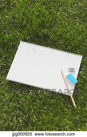 Pencil and sketchbook on grass View Large Photo Image Stock Photography - Pencil and sketchbook on grass. Fotosearch