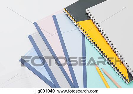 Stock Image - Pencils and notebooks. Fotosearch