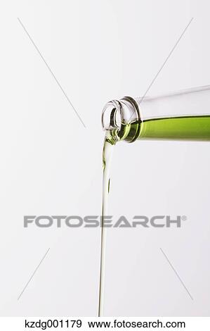 Pouring grape seed oil View Large Photo Image Stock Photo - Pouring grape seed oil. Fotosearch