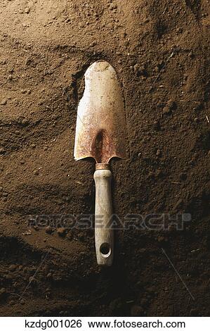 Shovel and soil View Large Photo Image Stock Photograph - Shovel and soil . Fotosearch