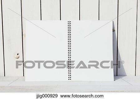 Sketchbook against white wooden wall View Large Photo Image Stock Photo - Sketchbook against white wooden wall. Fotosearch