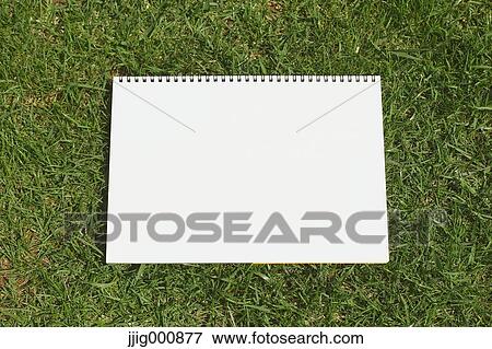 Sketchbook on grass View Large Photo Image Stock Photo - Sketchbook on grass. Fotosearch