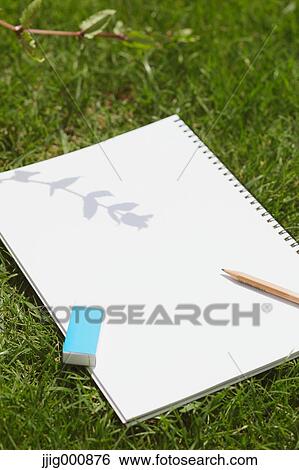 Sketchbook on grass View Large Photo Image Stock Photograph - Sketchbook on grass. Fotosearch