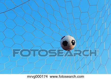 Picture - Soccer ball in the net. Fotosearch