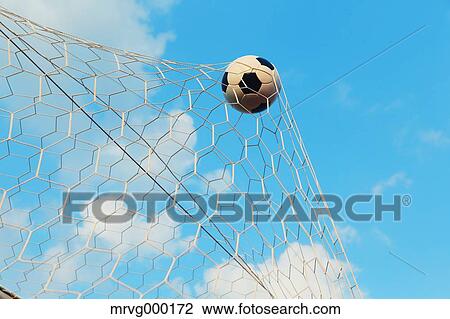 Soccer ball in the net View Large Photo Image Stock Image - Soccer ball in the net. Fotosearch