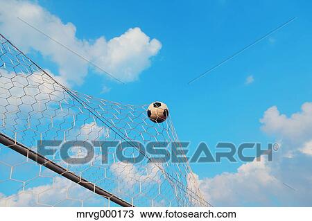 Soccer ball in the net View Large Photo Image Stock Image - Soccer ball in the net. Fotosearch