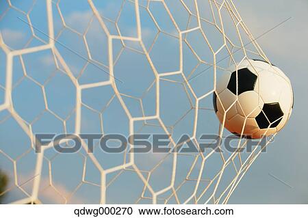 Soccer ball in the net View Large Photo Image Stock Image - Soccer ball in the net. Fotosearch