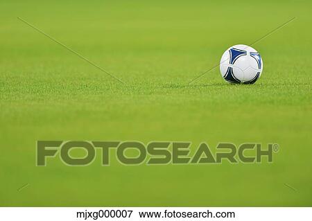 Soccer ball on grassland View Large Photo Image Stock Photo - Soccer ball on grassland. Fotosearch