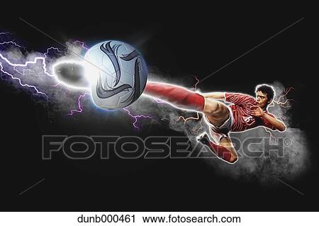 Soccer Player Kicking The Ball In Mid-Air View Large Photo Image Stock Image - Soccer Player Kicking The Ball In Mid-Air. Fotosearch