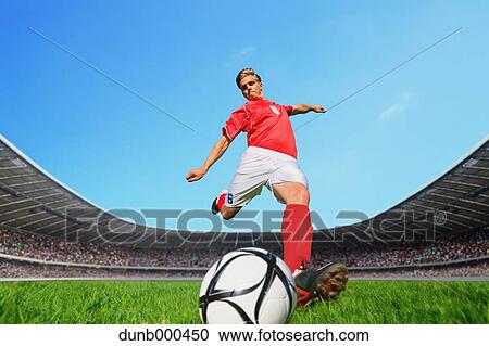 Soccer Player Kicking The Ball View Large Photo Image Stock Image - Soccer Player Kicking The Ball. Fotosearch