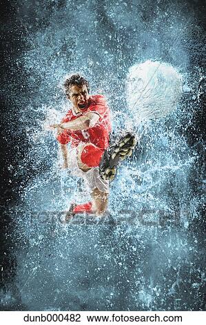 Soccer Player Kicking The Ball View Large Photo Image Stock Image - Soccer Player Kicking The Ball. Fotosearch