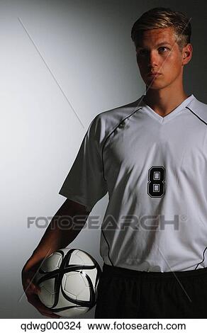 Soccer Player Standing With Ball View Large Photo Image Picture - Soccer Player Standing With Ball. Fotosearch