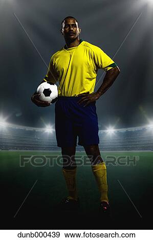 Soccer Player Standing With Ball View Large Photo Image Stock Photo - Soccer Player Standing With Ball. Fotosearch