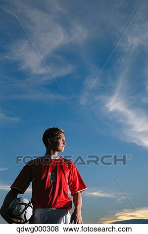 Soccer Player Standing With Ball View Large Photo Image Stock Photo - Soccer Player Standing With Ball. Fotosearch