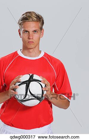 Soccer Player Standing With Ball View Large Photo Image Stock Photo - Soccer Player Standing With Ball. Fotosearch