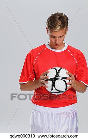 Soccer Player Standing With Ball View Large Photo Image Stock Photo - Soccer Player Standing With Ball. Fotosearch