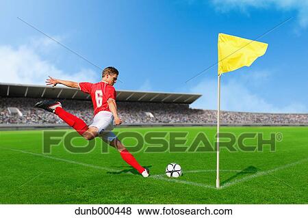 Stock Photo - Soccer Player Taking Corner Kick. Fotosearch