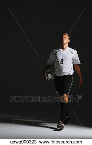 Soccer Player Walking With Ball View Large Photo Image Stock Image - Soccer Player Walking With Ball. Fotosearch