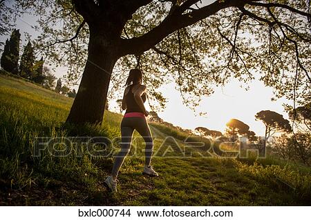 Young Girl Running In A Park View Large Photo Image Picture - Young Girl Running In A Park. Fotosearch