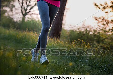 Young Girl Running In A Park View Large Photo Image Stock Image - Young Girl Running In A Park. Fotosearch