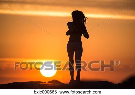 Stock Photography - Young Girl Running On A Pier. Fotosearch