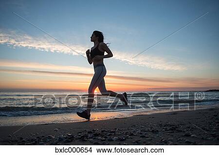 Young Girl Running On The Beach View Large Photo Image Picture - Young Girl Running On The Beach. Fotosearch