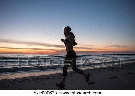 Young Girl Running On The Beach View Large Photo Image Stock Photo - Young Girl Running On The Beach. Fotosearch