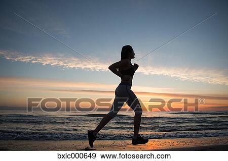 Young Girl Running On The Beach View Large Photo Image Stock Photo - Young Girl Running On The Beach. Fotosearch