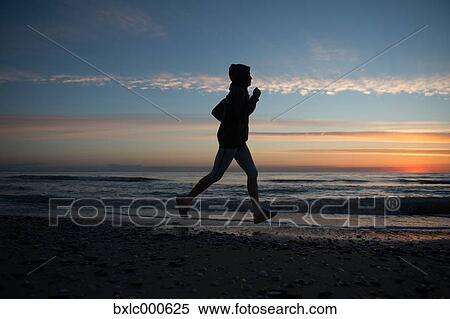 Young Girl Running On The Beach View Large Photo Image Stock Photography - Young Girl Running On The Beach. Fotosearch