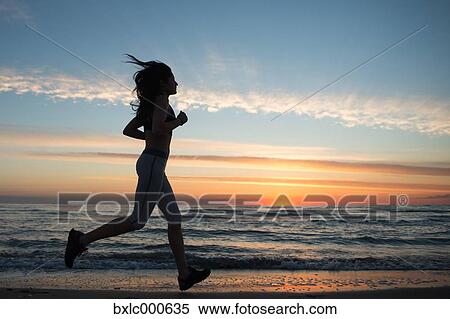 Young Girl Running On The Beach View Large Photo Image Stock Photography - Young Girl Running On The Beach. Fotosearch
