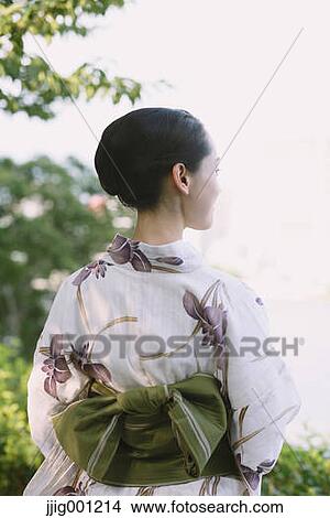 Young Japanese woman in a traditional kimono View Large Photo Image Picture - Young Japanese woman in a traditional kimono. Fotosearch