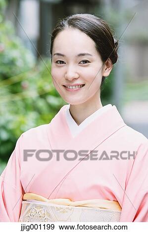 Stock Photo - Young Japanese woman in a traditional kimono. Fotosearch