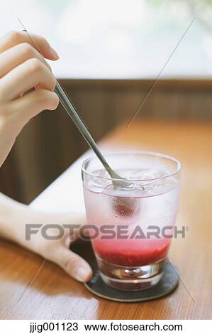 Young Japanese woman with raspberry soda in a cafe View Large Photo Image Stock Image - Young Japanese woman with raspberry soda in a cafe. Fotosearch