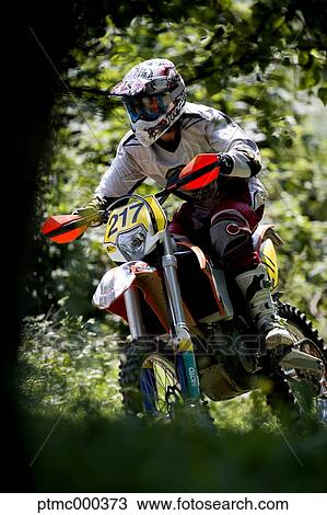 Young Man Riding Motocross Bike in Italian Countryside View Large Photo Image Stock Image - Young Man Riding Motocross Bike in Italian Countryside. Fotosearch