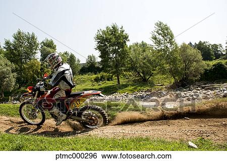 Young Man Riding Motocross Bike in Italian Countryside View Large Photo Image Stock Photograph - Young Man Riding Motocross Bike in Italian Countryside. Fotosearch