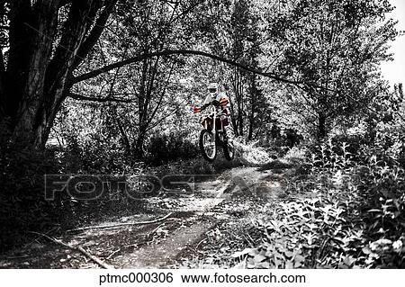 Young Man Riding Motocross Bike in Italian Countryside View Large Photo Image Stock Photograph - Young Man Riding Motocross Bike in Italian Countryside. Fotosearch