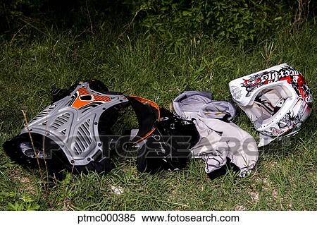Stock Photography - Young Man Riding Motocross Bike in Italian Countryside. Fotosearch