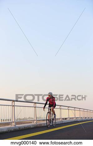 Young Japanese girl cycling View Large Photo Image Stock Image - Young Japanese girl cycling. Fotosearch