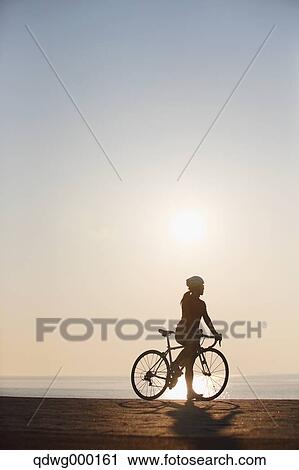 Young Japanese girl cycling View Large Photo Image Stock Image - Young Japanese girl cycling. Fotosearch