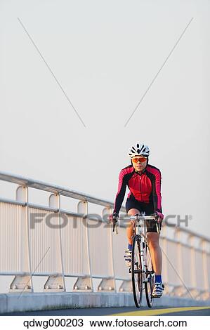 Young Japanese girl cycling View Large Photo Image Stock Image - Young Japanese girl cycling. Fotosearch