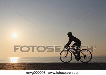Young Japanese girl cycling View Large Photo Image Stock Photo - Young Japanese girl cycling. Fotosearch