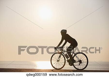 Young Japanese girl cycling View Large Photo Image Stock Photo - Young Japanese girl cycling. Fotosearch