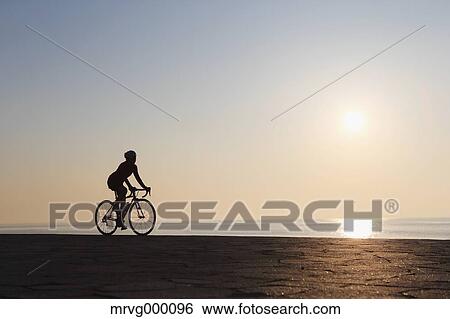 Young Japanese girl cycling View Large Photo Image Stock Photograph - Young Japanese girl cycling. Fotosearch