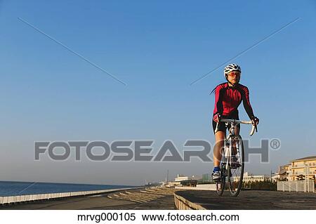 Young Japanese girl cycling View Large Photo Image Stock Photography - Young Japanese girl cycling. Fotosearch