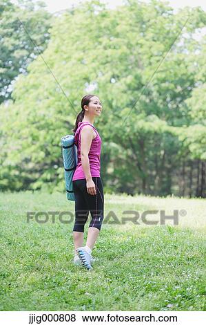 Young Japanese girl in fitness clothes in the park View Large Photo Image Stock Photo - Young Japanese girl in fitness clothes in the park. Fotosearch