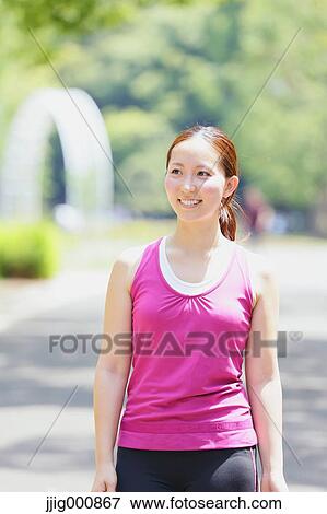 Young Japanese girl in fitness clothes in the park View Large Photo Image Stock Photo - Young Japanese girl in fitness clothes in the park. Fotosearch